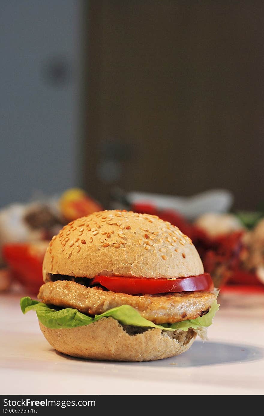 An hamburger with blurred background. An hamburger with blurred background