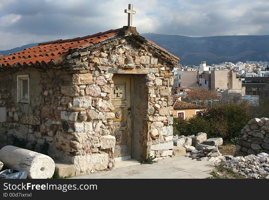 Photo of small shrine at Acropolis in city of Athens (Greece). Photo of small shrine at Acropolis in city of Athens (Greece).