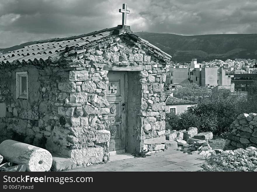 Photo of small shrine at Acropolis in city of Athens (Greece). Photo of small shrine at Acropolis in city of Athens (Greece).