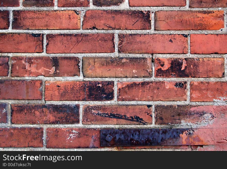 Grungy brick with some metal