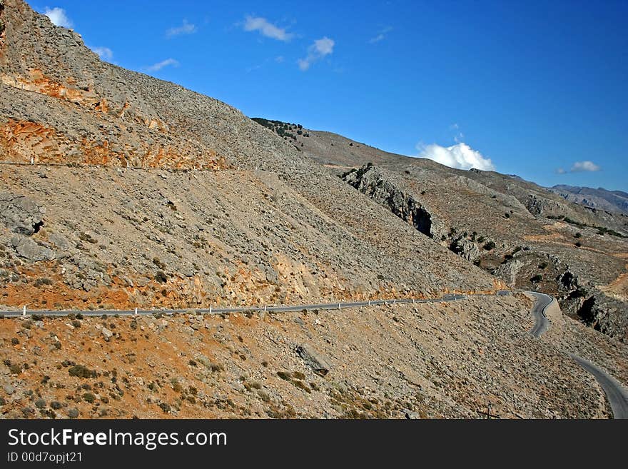 Narrow risky mountain road on Crete (Greece). Narrow risky mountain road on Crete (Greece).