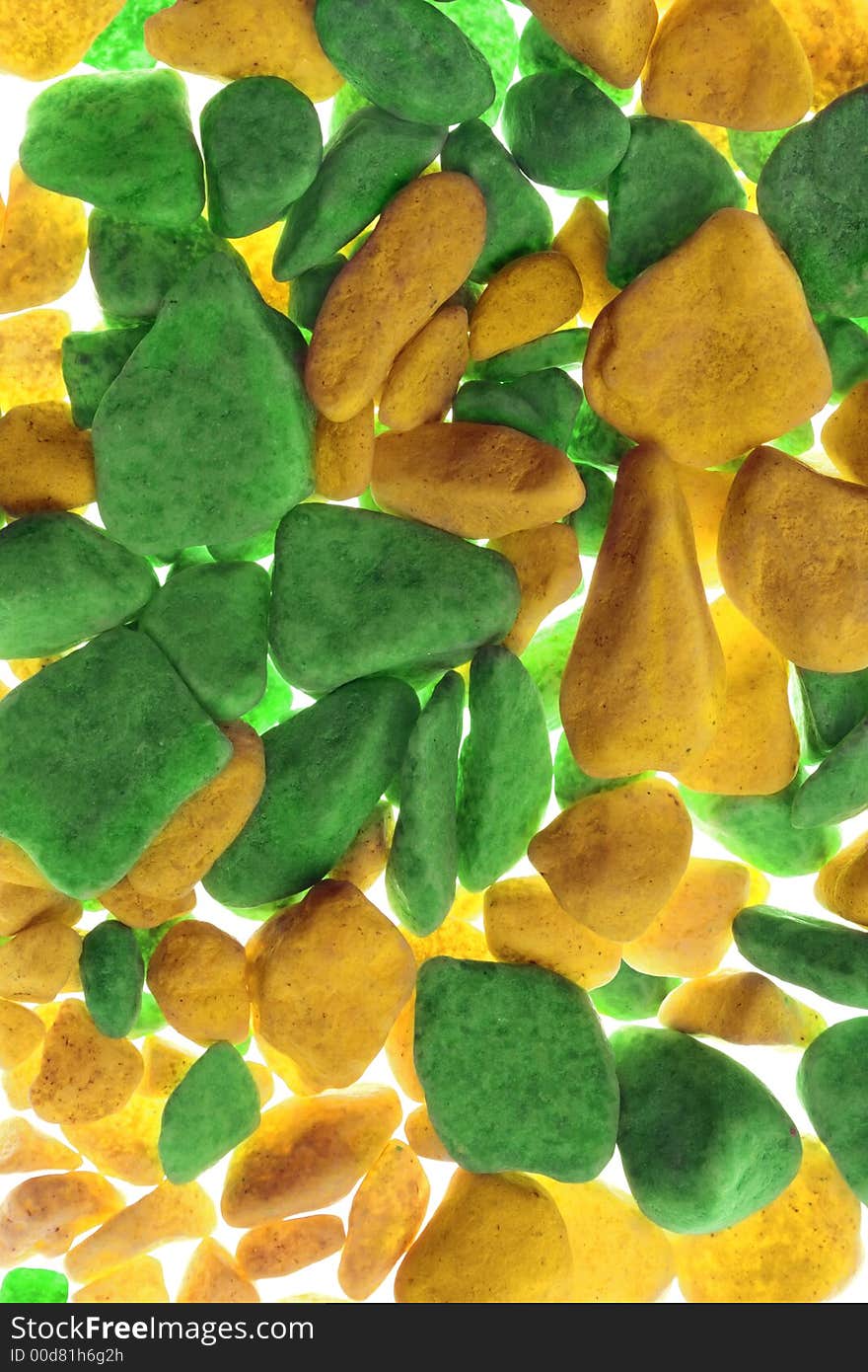 Yellow-green background of a painted gravel. Yellow-green background of a painted gravel