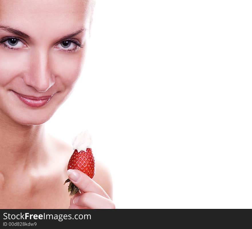 Beautiful young naked girl with red juicy strawberry