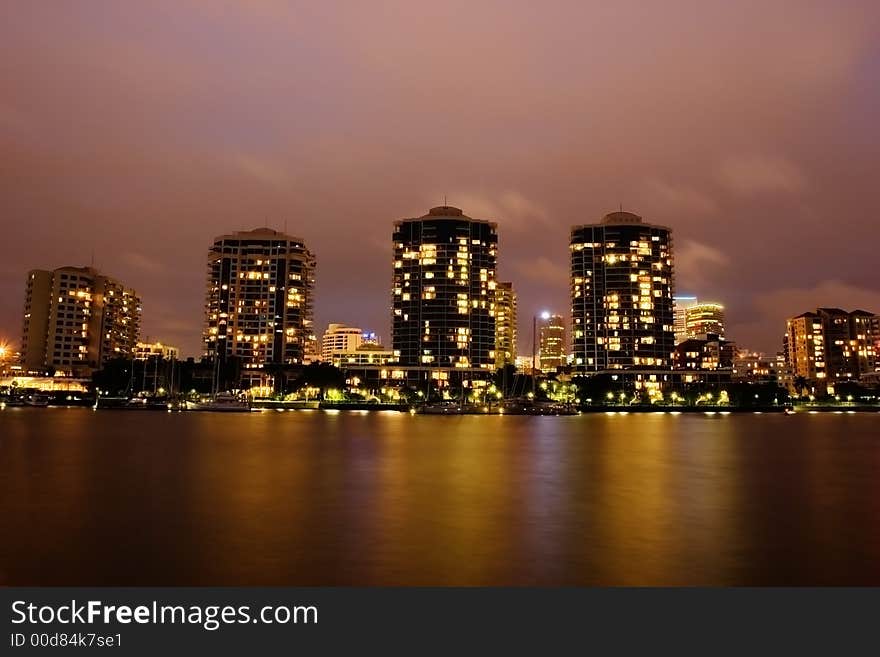 Modern river front buildings in the evening. Modern river front buildings in the evening