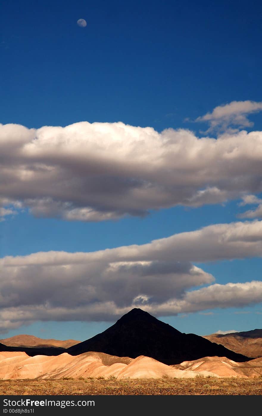 Moon over black mountain