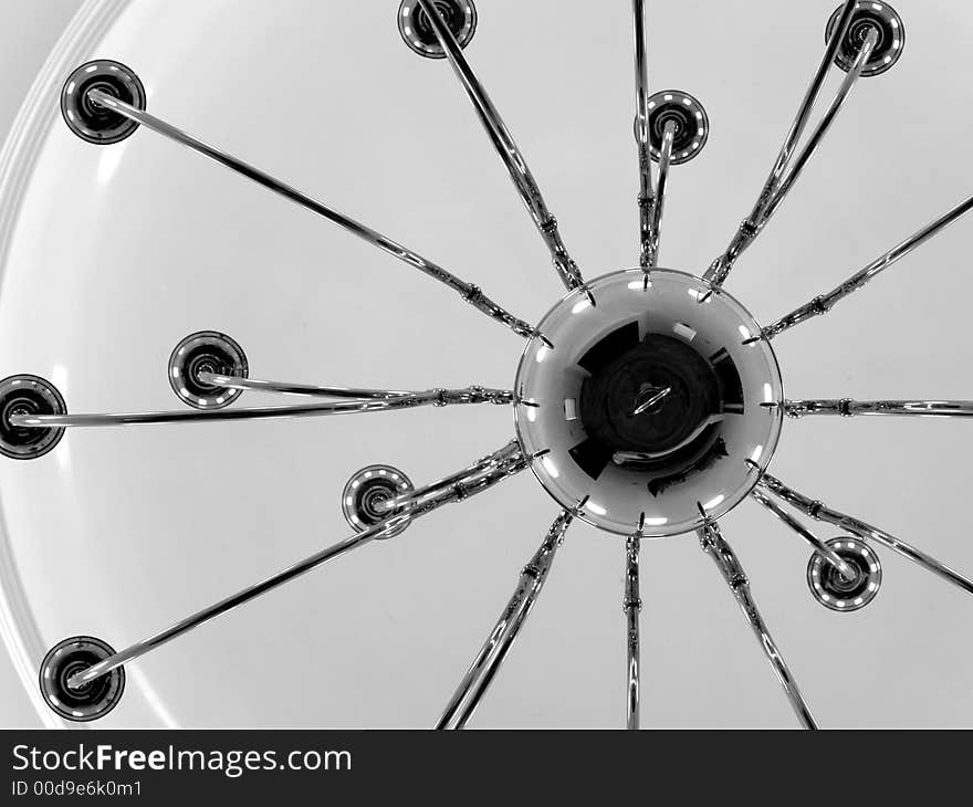 Abstract view looking up at a chandelier