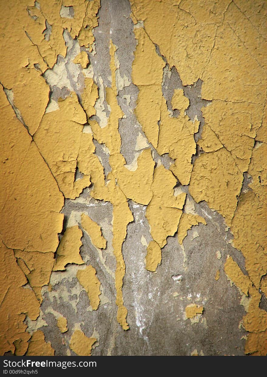 Close up of a cracked and painted wall. Close up of a cracked and painted wall