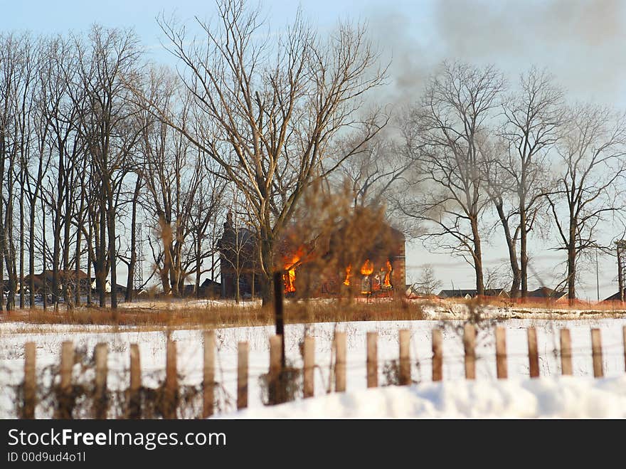 Photo of a house in the wooden area. Photo of a house in the wooden area