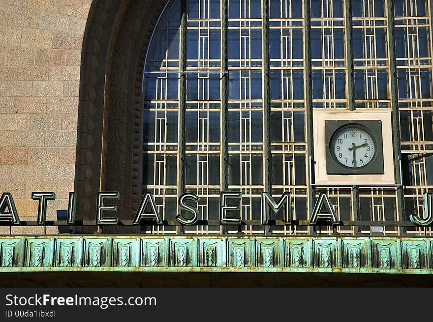 A clock on the wall of helsinki train station. A clock on the wall of helsinki train station