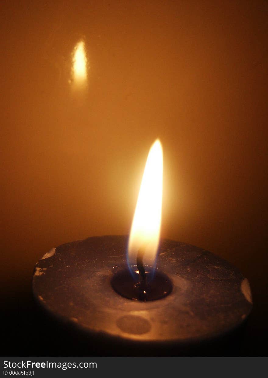 Burning candle in darkness (the second candle). Burning candle in darkness (the second candle)