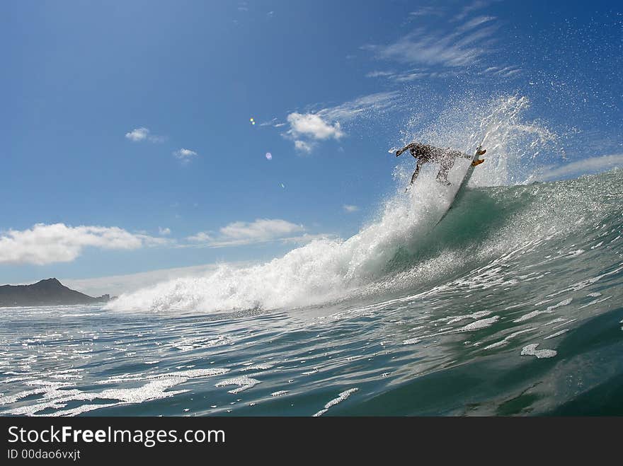 A surfer busting an air
