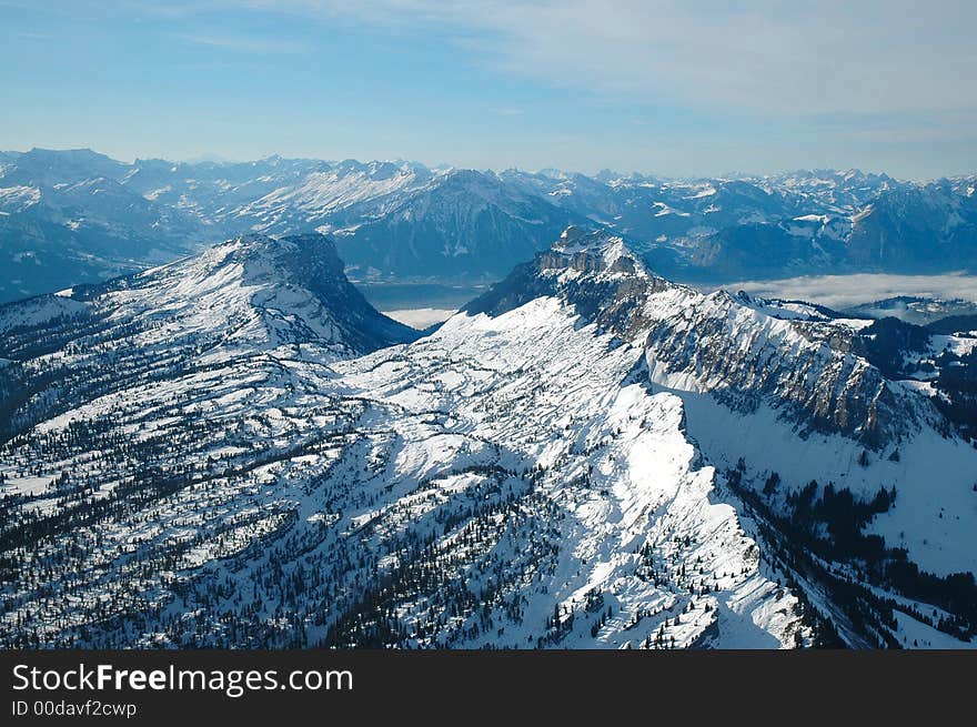 Beautiful mountains, snow and skies. Beautiful mountains, snow and skies