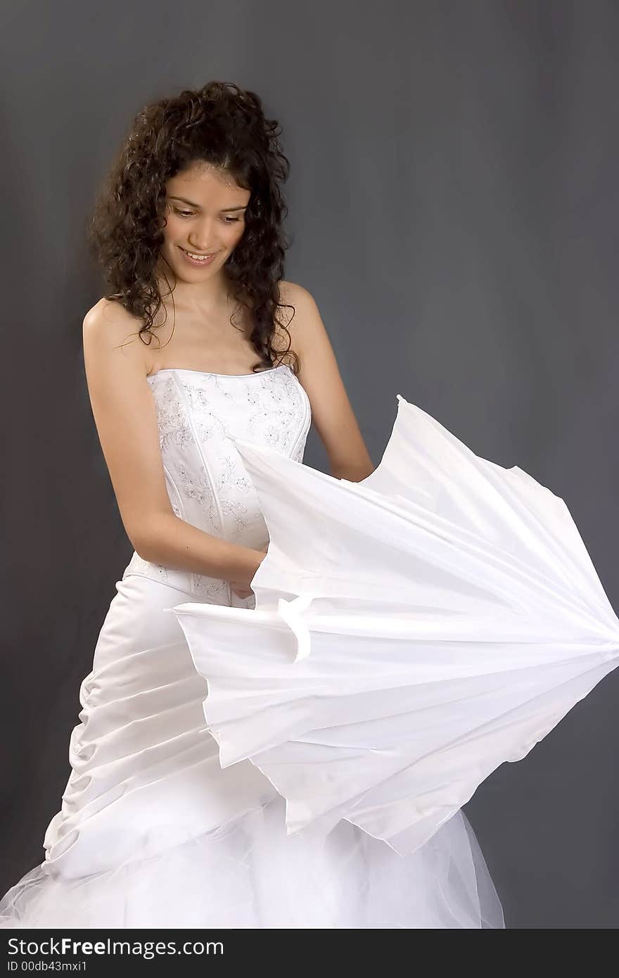 Attractive bride wearing white dress