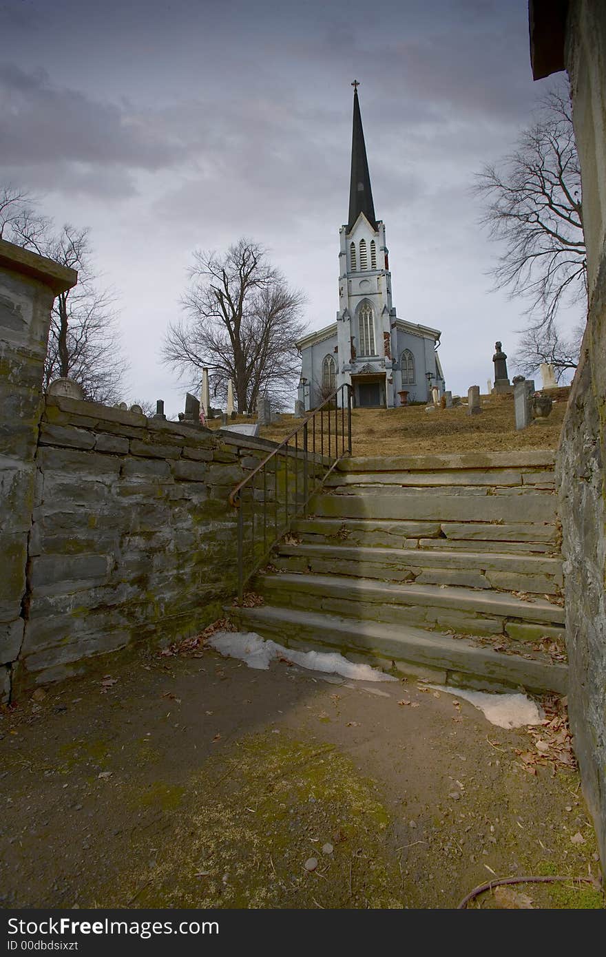 Long shot of a church and its grave yard. Long shot of a church and its grave yard