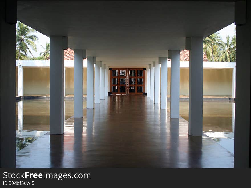 A corridor of a hotel in a tropical country. A corridor of a hotel in a tropical country.