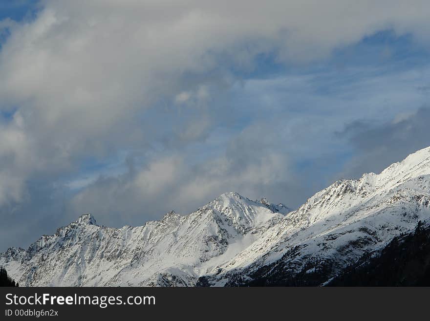 Snowy peak of mountain in the sky 2. Snowy peak of mountain in the sky 2