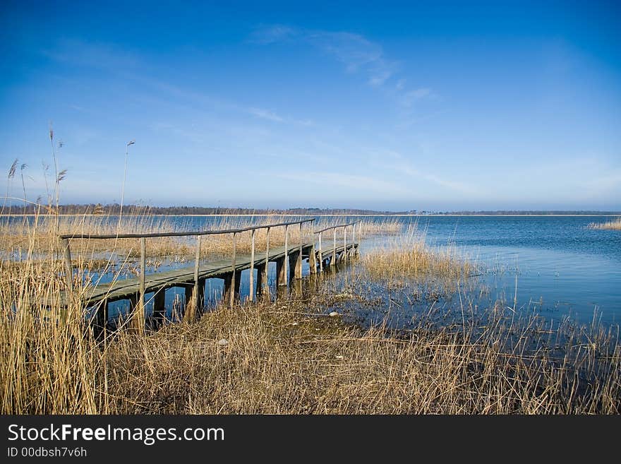 Wooden Jetty At Lake.