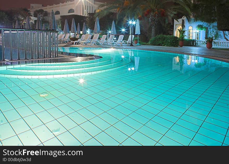 Photo of huge swimming pool at night. Photo of huge swimming pool at night