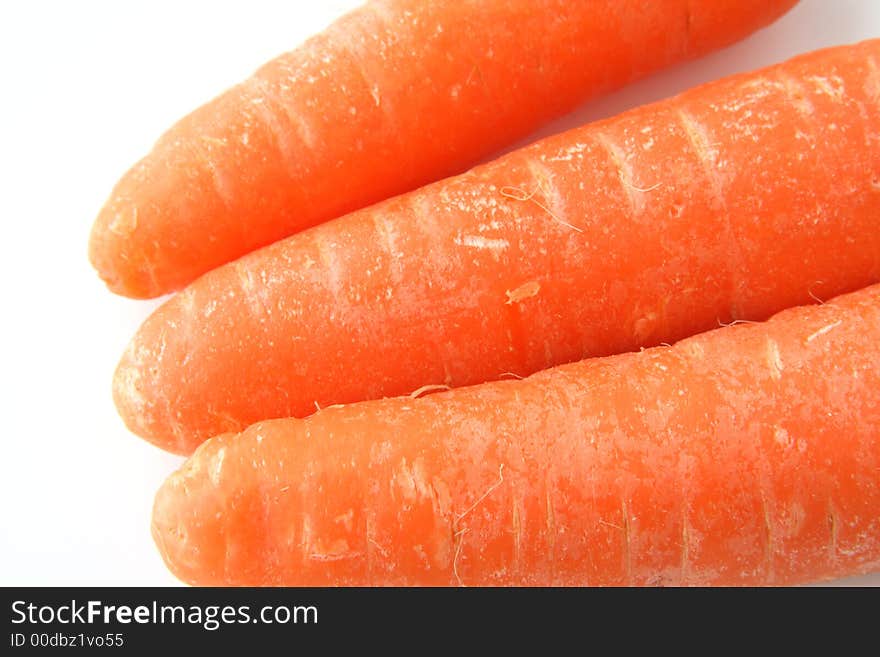 Carrots on the background clouseup. Carrots on the background clouseup