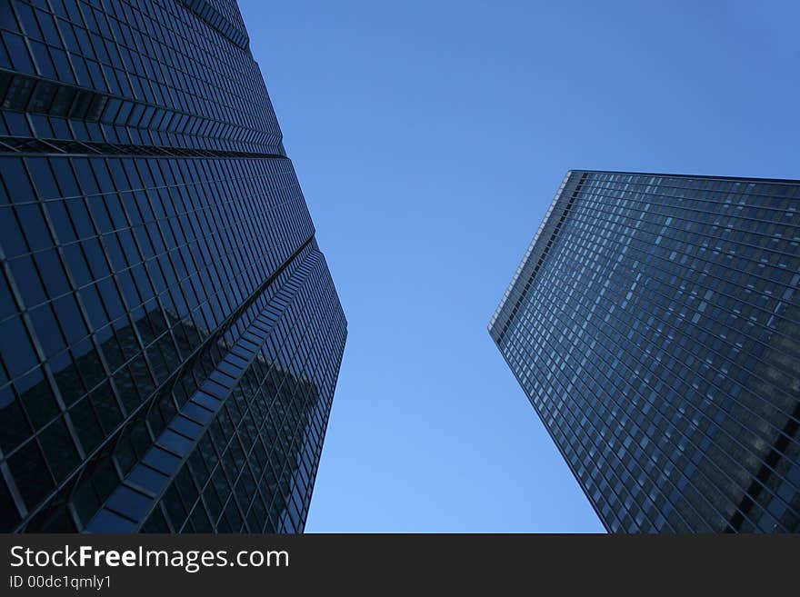 Looking up at skyscrapers