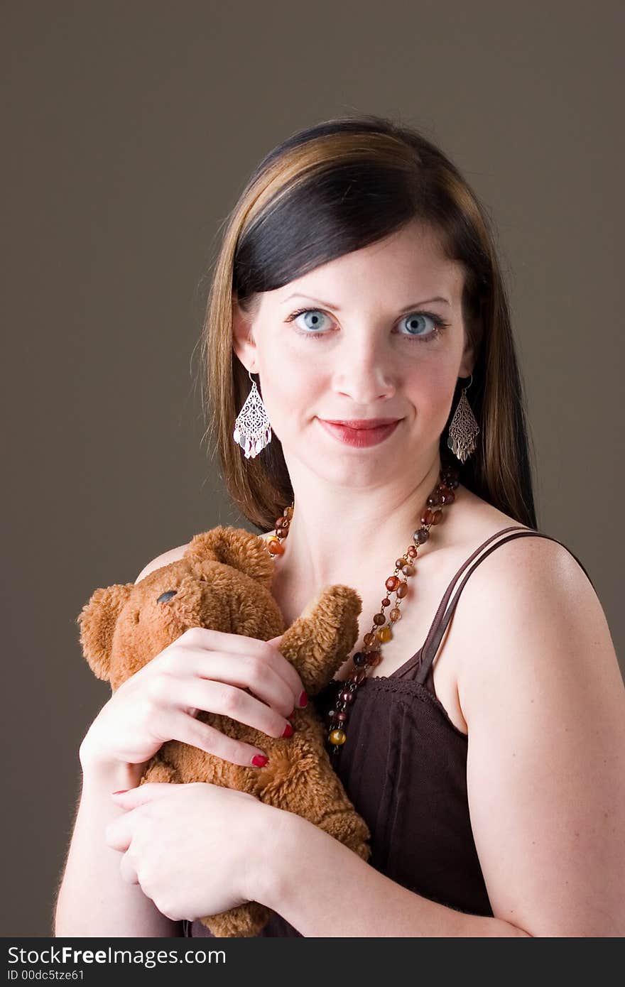 Pretty Brunette Girl With Teddy Bear