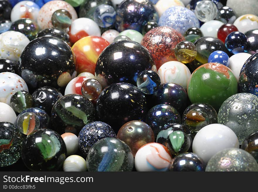 Different glass-balls in all sizes, suitable as backgrounds and designs, with diminishing perspective. Different glass-balls in all sizes, suitable as backgrounds and designs, with diminishing perspective