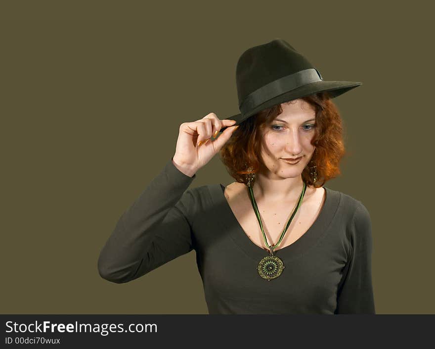 Red haired girl in a hat