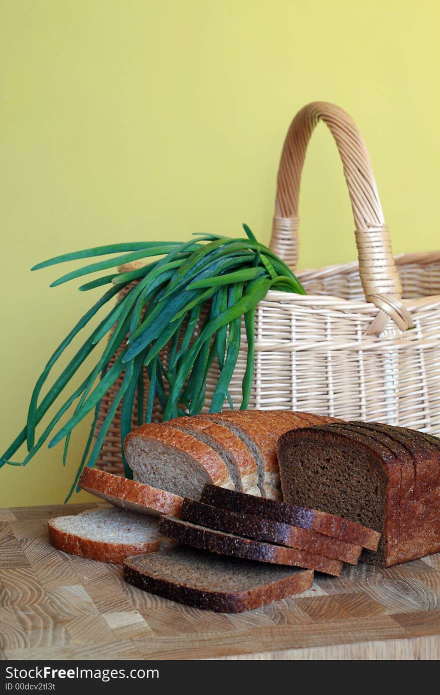 Black and white bread and onion in the basket