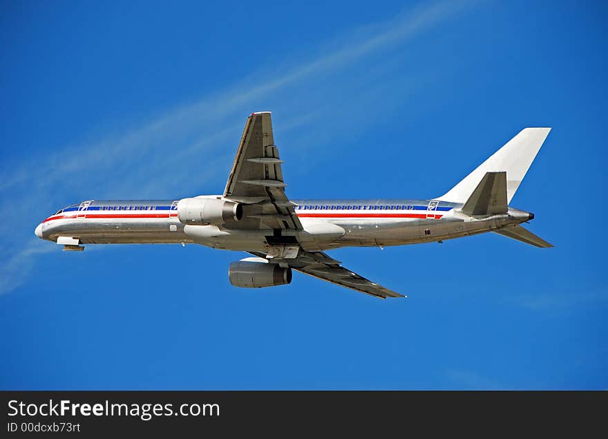 Silver Boeing jet airplane in flight