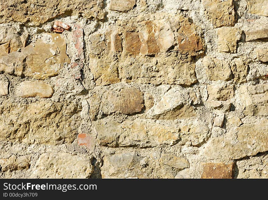 A wall made of stone. A wall made of stone