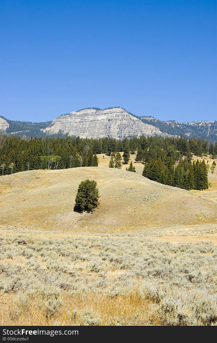 Blue sky and hillsides