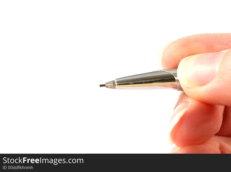 Hand holding a pencil, just about to write