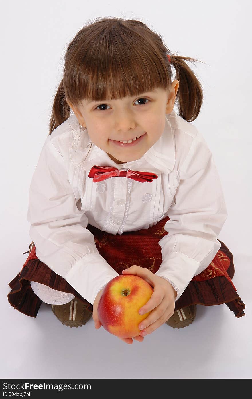 Picture of little smiling girl with big apple. Picture of little smiling girl with big apple