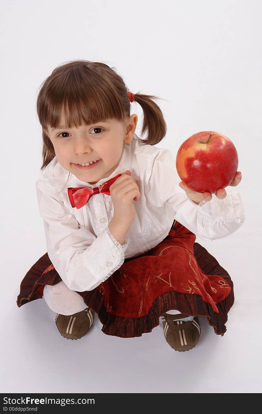 Picture of little smiling girl with big apple. Picture of little smiling girl with big apple