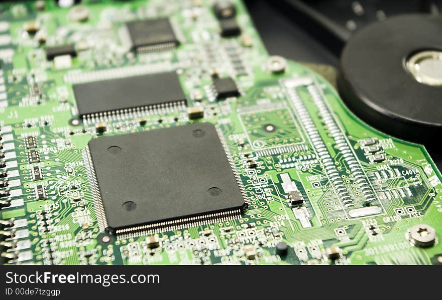 Closeup of a printed circuit board on a hard disk drive