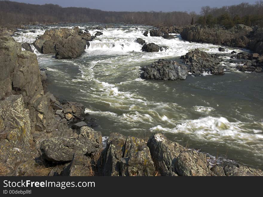 Rapids flows over the rocks at Great Falls Virginia. Rapids flows over the rocks at Great Falls Virginia