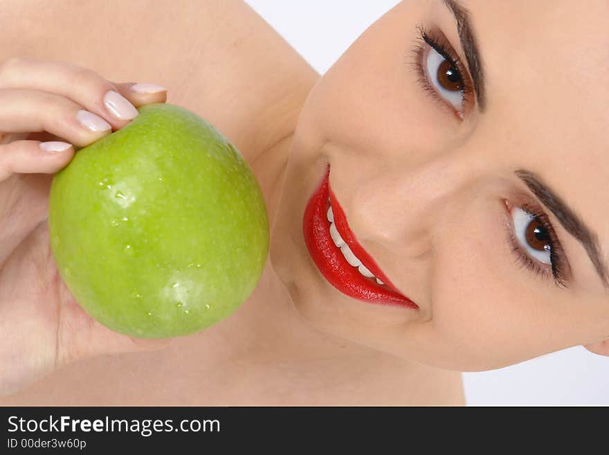 Portrait of beauty woman with apple