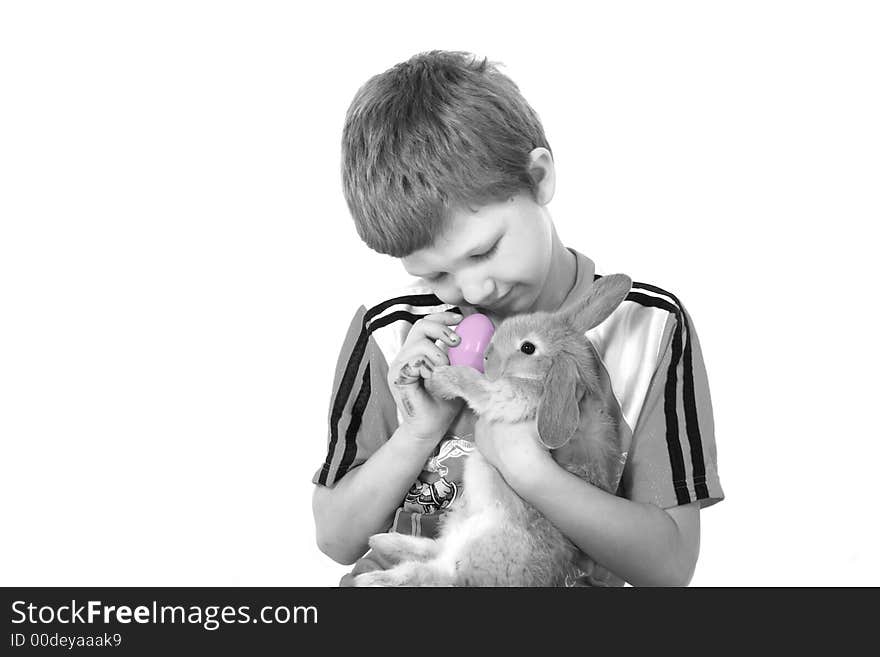 Adorable little boy holding a Easter bunny. Adorable little boy holding a Easter bunny.