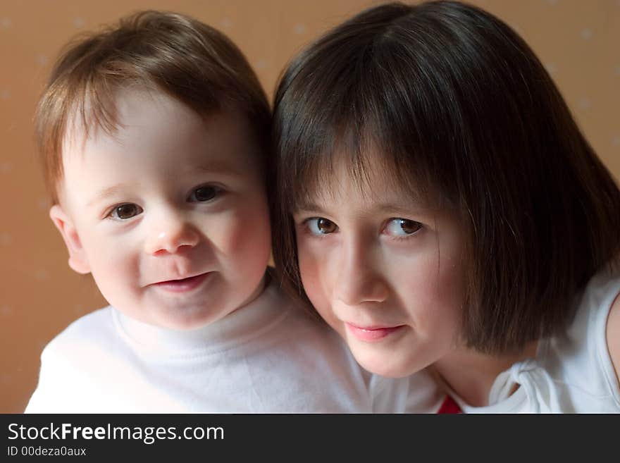 Pretty girl and her cute little brother. Pretty girl and her cute little brother