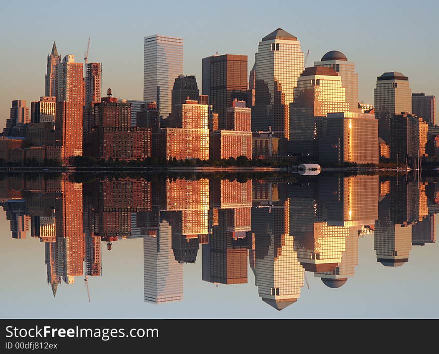 Lower Manhattan and reflection at sunset. Lower Manhattan and reflection at sunset