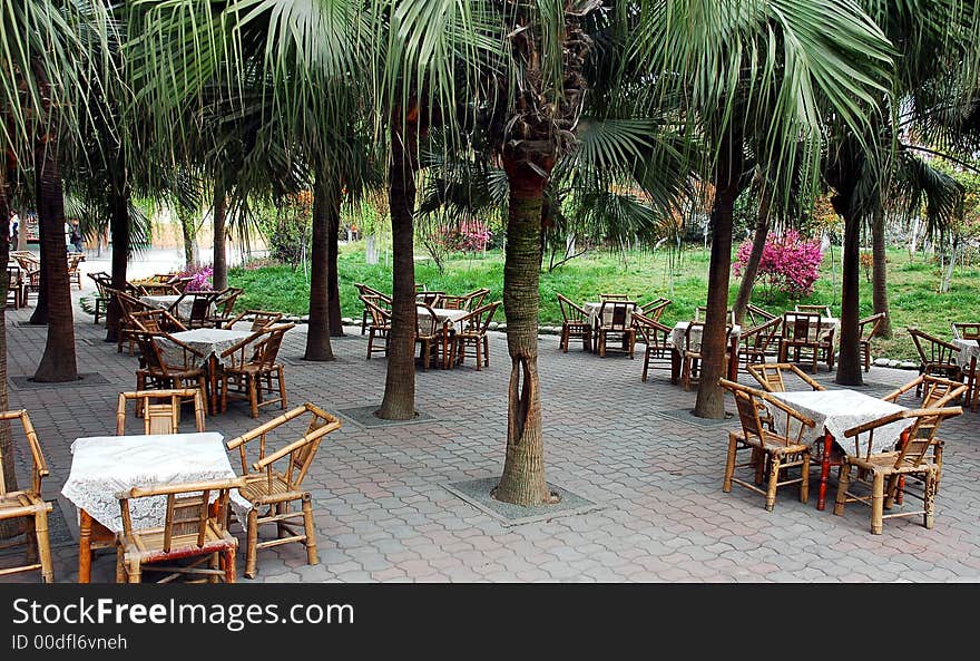 Chairs and tables in a garden in China. Chairs and tables in a garden in China