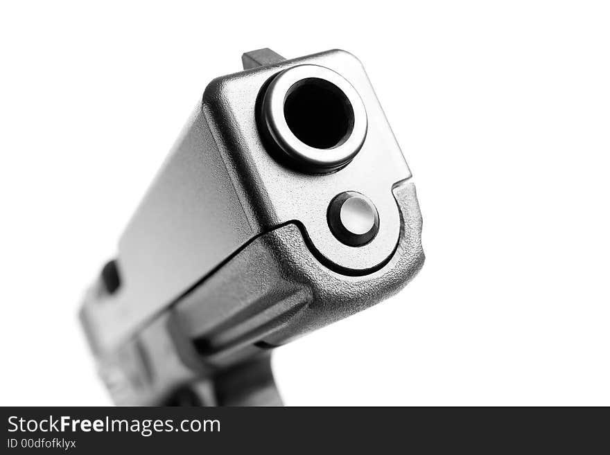 Gun macro isolated on white, shallow dof with focus on front