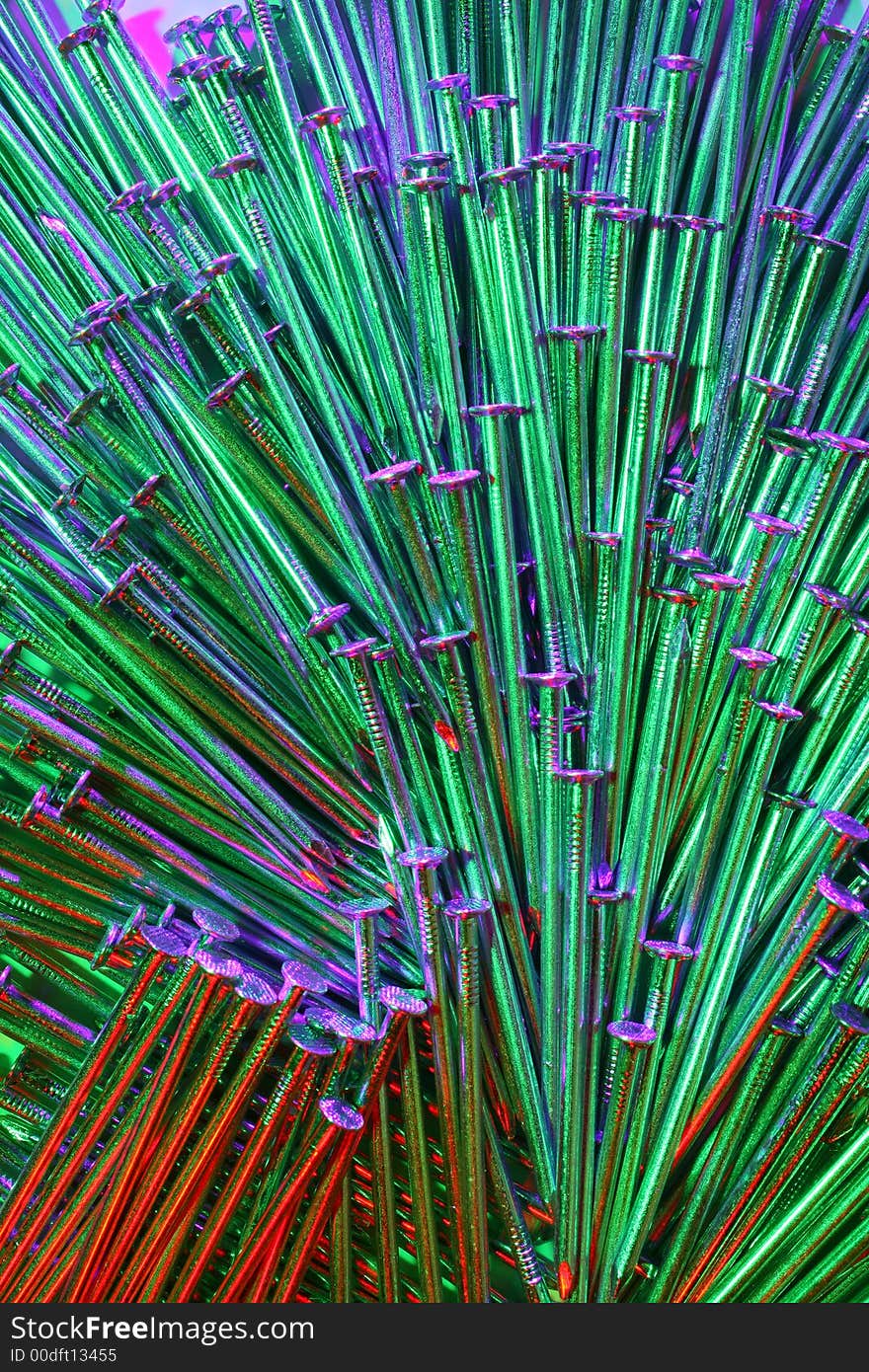 Arrangement of nails,with light from three directions each in an other colour. Arrangement of nails,with light from three directions each in an other colour