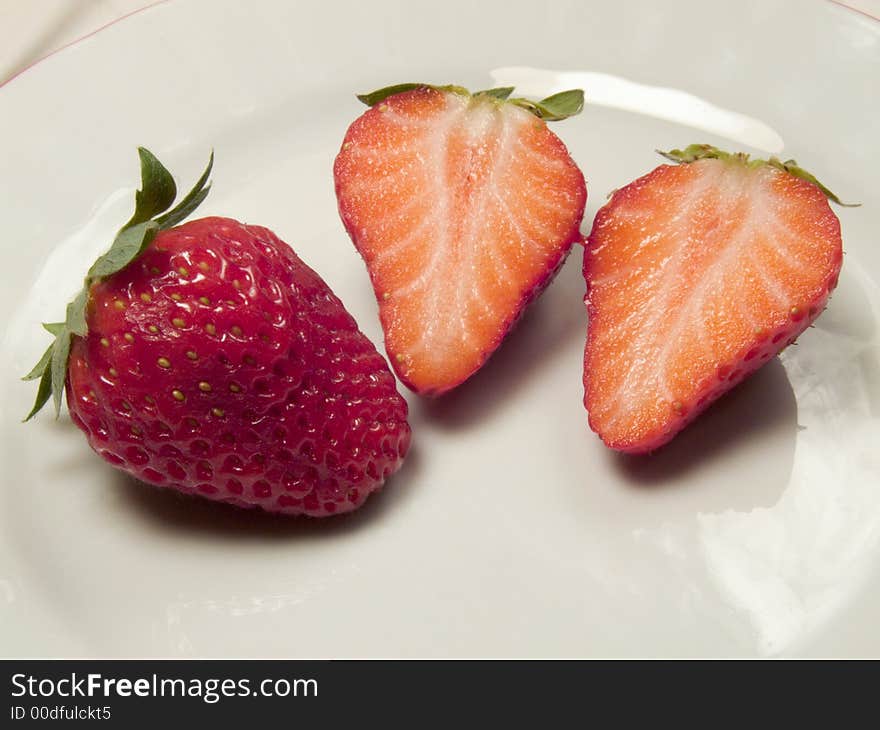 Red  and good strawberries on a white background