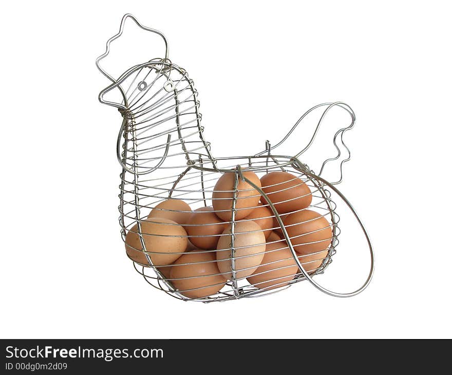 Eggs in the basket on white.Basket like a chicken. Eggs in the basket on white.Basket like a chicken.