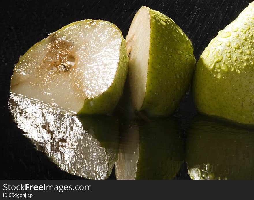 Pear is a fruit that has a yellow or green skin and is white inside. Pears are thinner at the top (i.e. where they join onto the tree) than at the bottom.