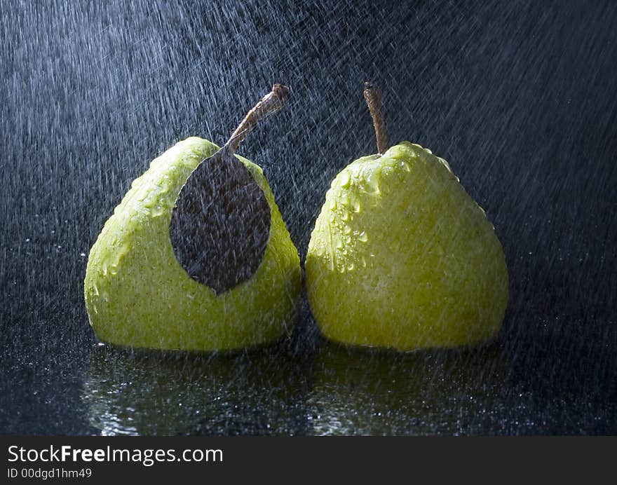 Pear is a fruit that has a yellow or green skin and is white inside. Pears are thinner at the top (i.e. where they join onto the tree) than at the bottom. Pear is a fruit that has a yellow or green skin and is white inside. Pears are thinner at the top (i.e. where they join onto the tree) than at the bottom.