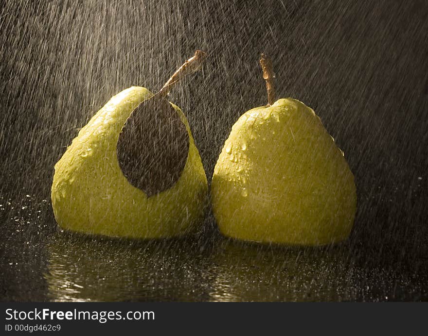 Pear is a fruit that has a yellow or green skin and is white inside. Pears are thinner at the top (i.e. where they join onto the tree) than at the bottom. Pear is a fruit that has a yellow or green skin and is white inside. Pears are thinner at the top (i.e. where they join onto the tree) than at the bottom.