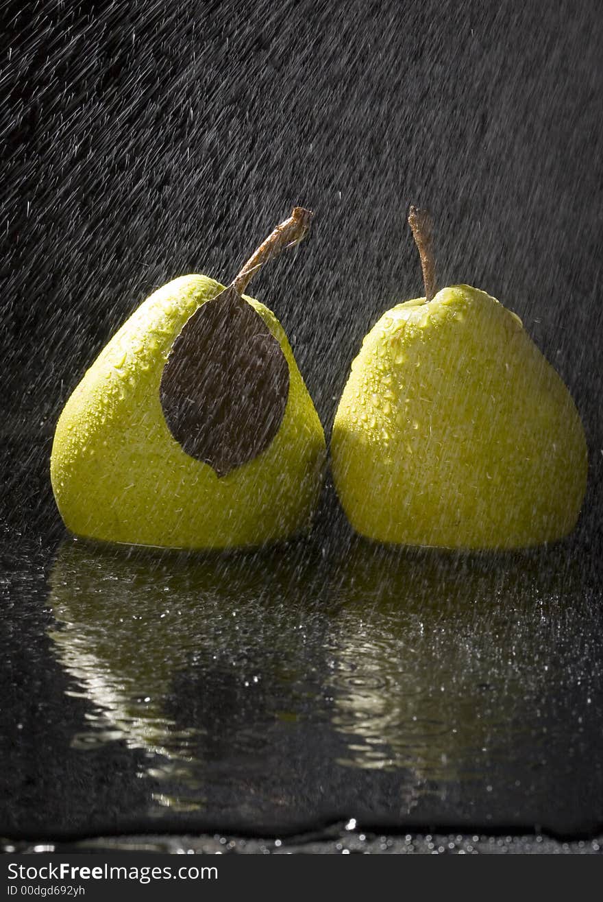 Pear is a fruit that has a yellow or green skin and is white inside. Pears are thinner at the top (i.e. where they join onto the tree) than at the bottom. Pear is a fruit that has a yellow or green skin and is white inside. Pears are thinner at the top (i.e. where they join onto the tree) than at the bottom.