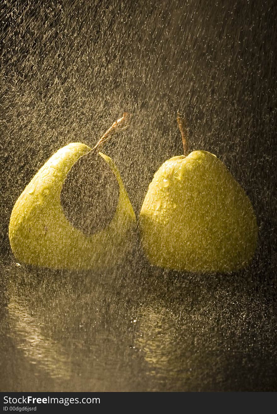 Pear is a fruit that has a yellow or green skin and is white inside. Pears are thinner at the top (i.e. where they join onto the tree) than at the bottom. Pear is a fruit that has a yellow or green skin and is white inside. Pears are thinner at the top (i.e. where they join onto the tree) than at the bottom.